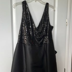 Adrianna Papell gown with sequin top and bow on the back